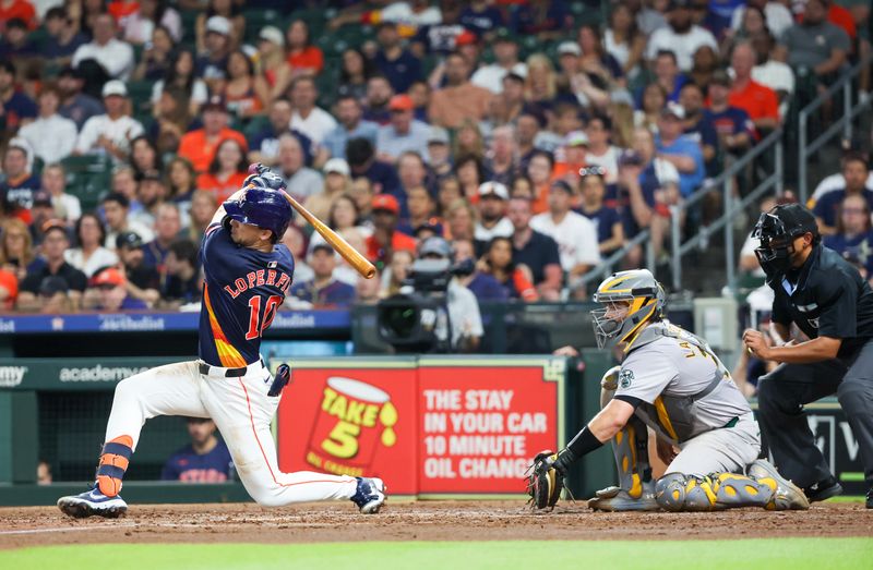 May 15, 2024; Houston, Texas, USA; Houston Astros center fielder Joey Loperfido (10) hits a sacrifice RBI against the Oakland Athletics  in the fourth inning at Minute Maid Park. Mandatory Credit: Thomas Shea-USA TODAY Sports