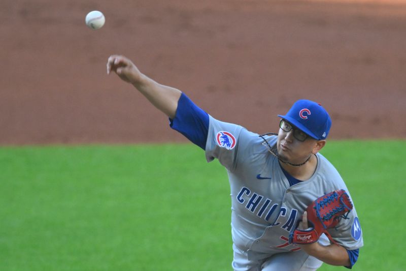 Aug 13, 2024; Cleveland, Ohio, USA; Chicago Cubs starting pitcher Javier Assad (72) delivers a pitch in the first inning against the Cleveland Guardians at Progressive Field. Mandatory Credit: David Richard-USA TODAY Sports