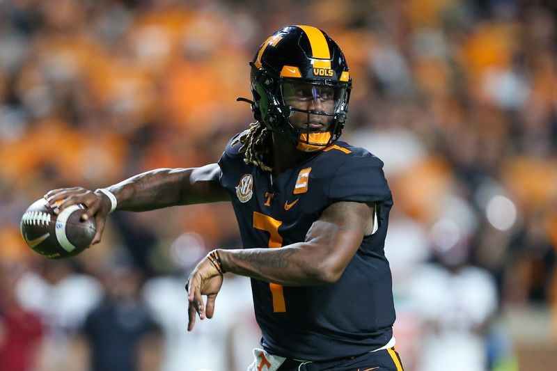 Sep 30, 2023; Knoxville, Tennessee, USA; Tennessee Volunteers quarterback Joe Milton III (7) passes the ball against the South Carolina Gamecocks during the first half at Neyland Stadium. Mandatory Credit: Randy Sartin-USA TODAY Sports