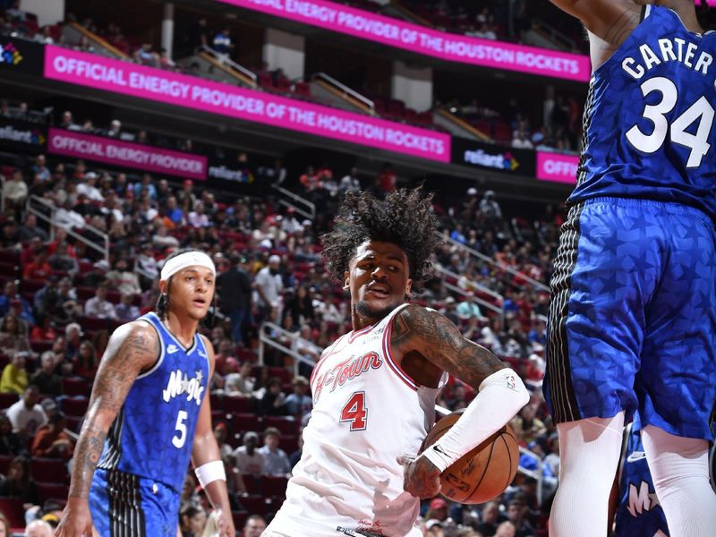 HOUSTON, TX - APRIL 9: Jalen Green #4 of the Houston Rockets handles the ball during the game against the Orlando Magic on April 9, 2024 at the Toyota Center in Houston, Texas. NOTE TO USER: User expressly acknowledges and agrees that, by downloading and or using this photograph, User is consenting to the terms and conditions of the Getty Images License Agreement. Mandatory Copyright Notice: Copyright 2024 NBAE (Photo by Logan Riely/NBAE via Getty Images)