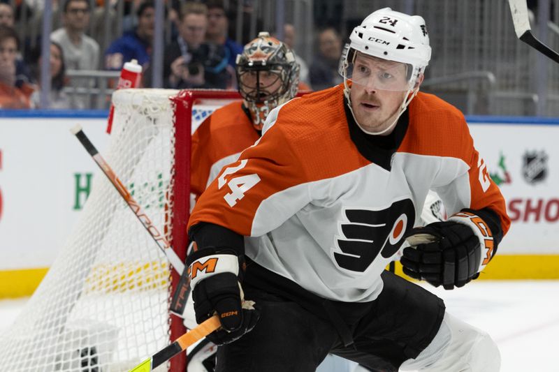 Nov 25, 2023; Elmont, New York, USA; New York Islanders defenseman Scott Mayfield (24) tracks the action against the New York Islanders during the second period at UBS Arena. Mandatory Credit: Thomas Salus-USA TODAY Sports