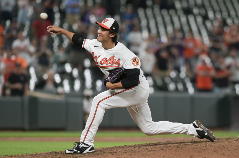 Aug 28, 2023; Baltimore, Maryland, USA;  Baltimore Orioles relief pitcher Shintaro Fujinami (14) throws a ninth inning pitch against the Chicago White Sox at Oriole Park at Camden Yards. Mandatory Credit: Tommy Gilligan-USA TODAY Sports