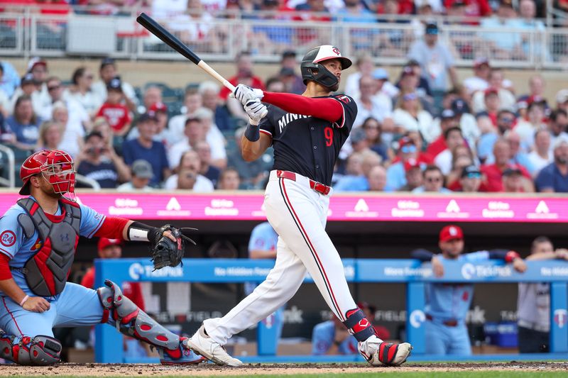 Aug 24, 2024; Minneapolis, Minnesota, USA; Minnesota Twins left fielder Trevor Larnach (9) hits a three-run home run against the St. Louis Cardinals during the third inning at Target Field. Mandatory Credit: Matt Krohn-USA TODAY Sports