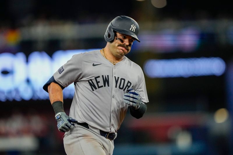 Jun 29, 2024; Toronto, Ontario, CAN; New York Yankees catcher Austin Wells (28) rounds third base after hitting a home run against the Toronto Blue Jays during the ninth inning at Rogers Centre. Mandatory Credit: Kevin Sousa-USA TODAY Sports