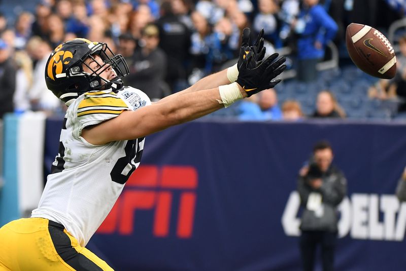 Dec 31, 2022; Nashville, Tennessee, USA; Iowa Hawkeyes tight end Luke Lachey (85) misses an overthrown ball in the end zone during the second half against the Kentucky Wildcats in the 2022 Music City Bowl at Nissan Stadium. Mandatory Credit: Christopher Hanewinckel-USA TODAY Sports