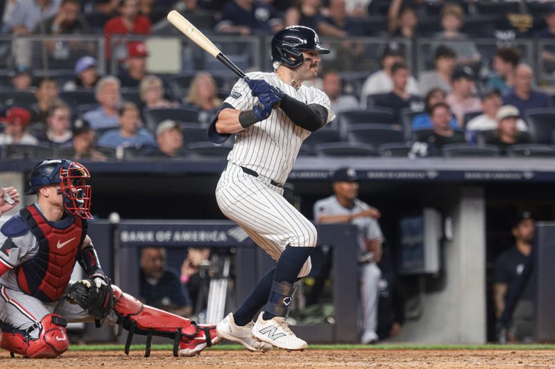 Jun 6, 2024; Bronx, New York, USA;  New York Yankees catcher Austin Wells (28) singles during the fifth inning against the Minnesota Twins at Yankee Stadium. Mandatory Credit: Vincent Carchietta-USA TODAY Sports