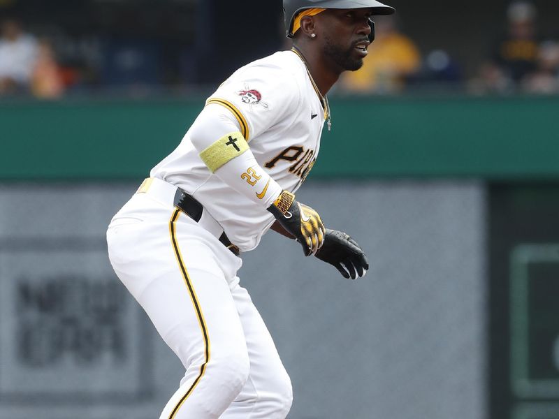 Jul 21, 2024; Pittsburgh, Pennsylvania, USA;  Pittsburgh Pirates designated hitter Andrew McCutchen (22) takes a lead on second base against the Philadelphia Phillies during the third inning at PNC Park. Mandatory Credit: Charles LeClaire-USA TODAY Sports