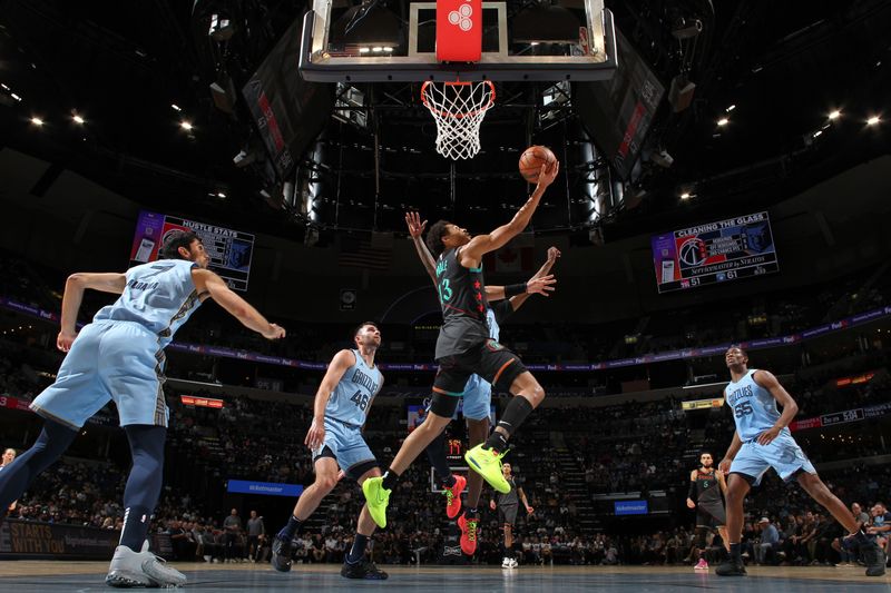 MEMPHIS, TN - MARCH 12: Jordan Poole #13 of the Washington Wizards shoots the ball during the game against the Memphis Grizzlies on March 12, 2024 at FedExForum in Memphis, Tennessee. NOTE TO USER: User expressly acknowledges and agrees that, by downloading and or using this photograph, User is consenting to the terms and conditions of the Getty Images License Agreement. Mandatory Copyright Notice: Copyright 2024 NBAE (Photo by Joe Murphy/NBAE via Getty Images)