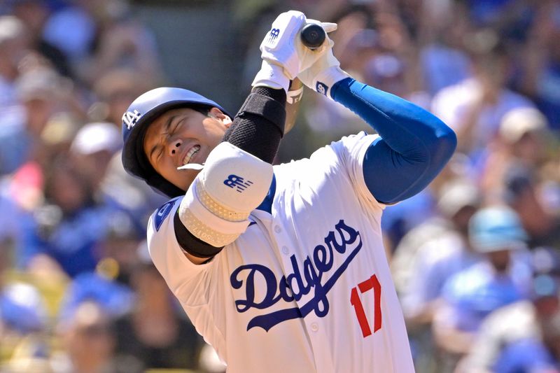 Aug 25, 2024; Los Angeles, California, USA;   Los Angeles Dodgers designated hitter Shohei Ohtani (17) reacts after he was hit by a pitch in the eighth inning against the Tampa Bay Rays at Dodger Stadium. Mandatory Credit: Jayne Kamin-Oncea-USA TODAY Sports