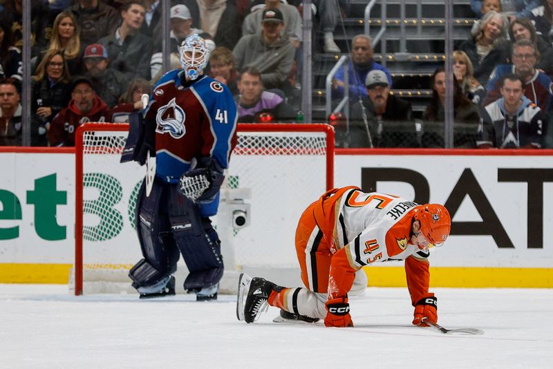 Nov 11, 2025; Denver, Colorado, USA; Anaheim Ducks right wing Beckett Sennecke (45) limps off the ice as h41 looks on in the second period at Ball Arena. Mandatory Credit: Isaiah J. Downing-Imagn Images