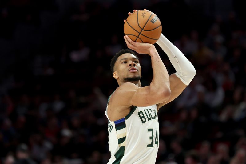 PORTLAND, OREGON - JANUARY 31: Giannis Antetokounmpo #34 of the Milwaukee Bucks shoots against the Portland Trail Blazers during the second quarter at Moda Center on January 31, 2024 in Portland, Oregon. (Photo by Steph Chambers/Getty Images)