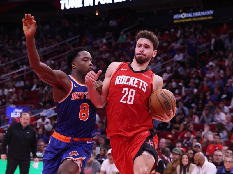 HOUSTON, TX - NOVEMBER 4: Alperen Sengun #28 of the Houston Rockets drives to the basket during the game against the New York Knicks on November 4, 2024 at the Toyota Center in Houston, Texas. NOTE TO USER: User expressly acknowledges and agrees that, by downloading and or using this photograph, User is consenting to the terms and conditions of the Getty Images License Agreement. Mandatory Copyright Notice: Copyright 2024 NBAE (Photo by Michael Starghill Jr./NBAE via Getty Images)