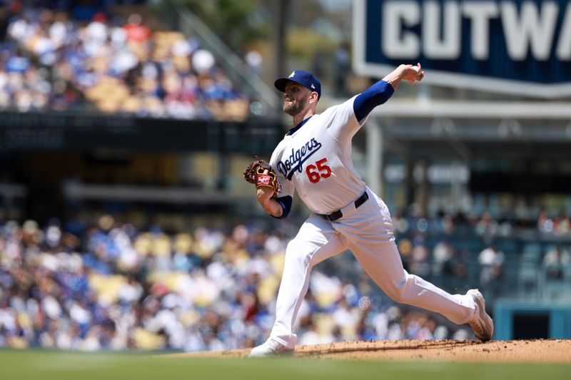 May 5, 2024; Los Angeles, California, USA;  Los Angeles Dodgers pitcher James Paxton (65) pitches during the second inning against the Atlanta Braves at Dodger Stadium. Mandatory Credit: Kiyoshi Mio-USA TODAY Sports