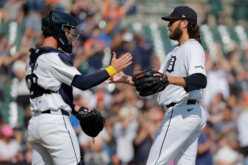 Sep 1, 2024; Detroit, Michigan, USA;  Detroit Tigers pitcher Jason Foley (68) and catcher Dillon Dingler (38) celebrate after defeating the Boston Red Sox at Comerica Park. Mandatory Credit: Rick Osentoski-USA TODAY Sports