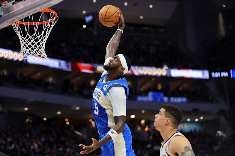 MILWAUKEE, WISCONSIN - FEBRUARY 12: Bobby Portis #9 of the Milwaukee Bucks dunks against the Denver Nuggets during the first half of a game at Fiserv Forum on February 12, 2024 in Milwaukee, Wisconsin. NOTE TO USER: User expressly acknowledges and agrees that, by downloading and or using this photograph, User is consenting to the terms and conditions of the Getty Images License Agreement. (Photo by Stacy Revere/Getty Images)