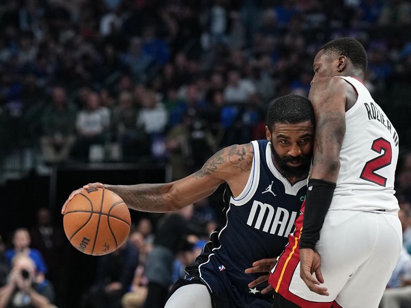 DALLAS, TX - MARCH 7: Kyrie Irving #11 of the Dallas Mavericks drives to the basket during the game against the Miami Heat on March 7, 2024 at the American Airlines Center in Dallas, Texas. NOTE TO USER: User expressly acknowledges and agrees that, by downloading and or using this photograph, User is consenting to the terms and conditions of the Getty Images License Agreement. Mandatory Copyright Notice: Copyright 2024 NBAE (Photo by Glenn James/NBAE via Getty Images)