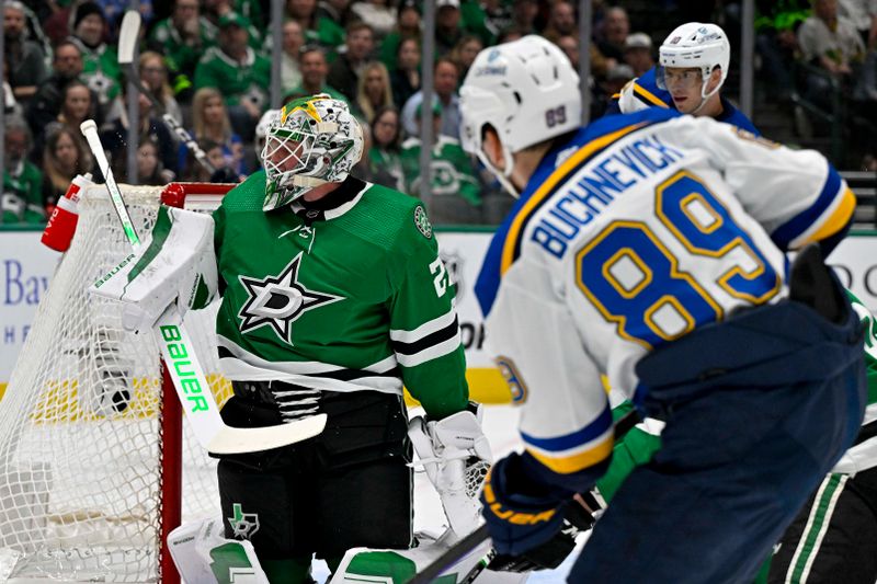 Apr 17, 2024; Dallas, Texas, USA; Dallas Stars goaltender Jake Oettinger (29) turns aside a shot by St. Louis Blues left wing Pavel Buchnevich (89) during the first period at the American Airlines Center. Mandatory Credit: Jerome Miron-USA TODAY Sports