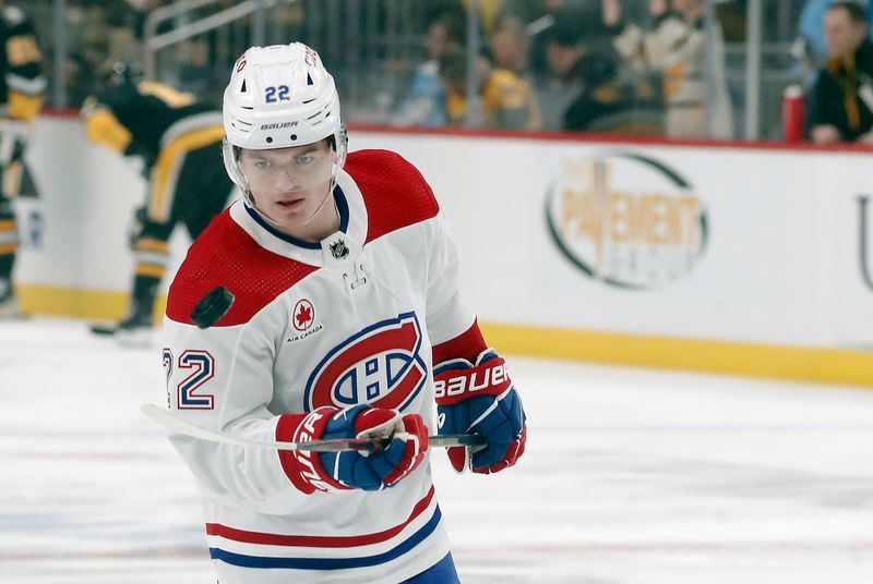 Feb 22, 2024; Pittsburgh, Pennsylvania, USA;  Montreal Canadiens right wing Cole Caufield (22) juggles a puck to warm up before the game against the Pittsburgh Penguins at PPG Paints Arena. Mandatory Credit: Charles LeClaire-USA TODAY Sports