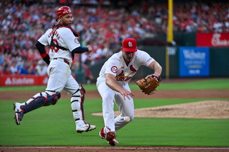 Jul 29, 2024; St. Louis, Missouri, USA;  St. Louis Cardinals starting pitcher Andre Pallante (53) is unable to field a ground ball against the Texas Rangers during the third inning at Busch Stadium. Mandatory Credit: Jeff Curry-USA TODAY Sports