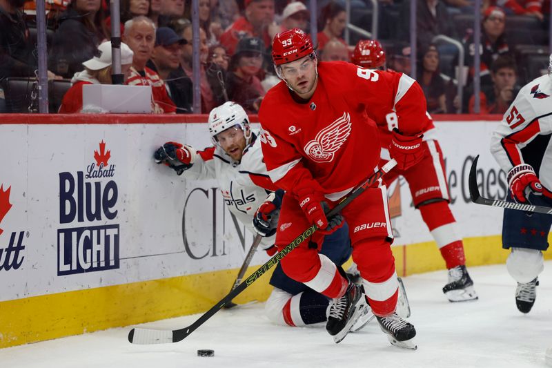 Apr 9, 2024; Detroit, Michigan, USA;  Detroit Red Wings right wing Alex DeBrincat (93) skates with the puck in the second period against the Washington Capitals at Little Caesars Arena. Mandatory Credit: Rick Osentoski-USA TODAY Sports