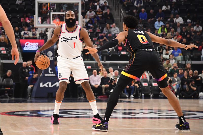 INGLEWOOD, CA - OCTOBER 31: James Harden #1 of the LA Clippers dribbles the ball during the game against the Phoenix Suns on October 31, 2024 at Intuit Dome in Los Angeles, California. NOTE TO USER: User expressly acknowledges and agrees that, by downloading and/or using this Photograph, user is consenting to the terms and conditions of the Getty Images License Agreement. Mandatory Copyright Notice: Copyright 2024 NBAE (Photo by Adam Pantozzi/NBAE via Getty Images)