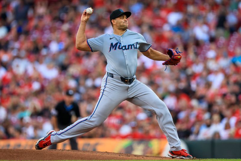 Jul 12, 2024; Cincinnati, Ohio, USA; Miami Marlins starting pitcher Yonny Chirinos (26) pitches against the Cincinnati Reds in the first inning at Great American Ball Park. Mandatory Credit: Katie Stratman-USA TODAY Sports