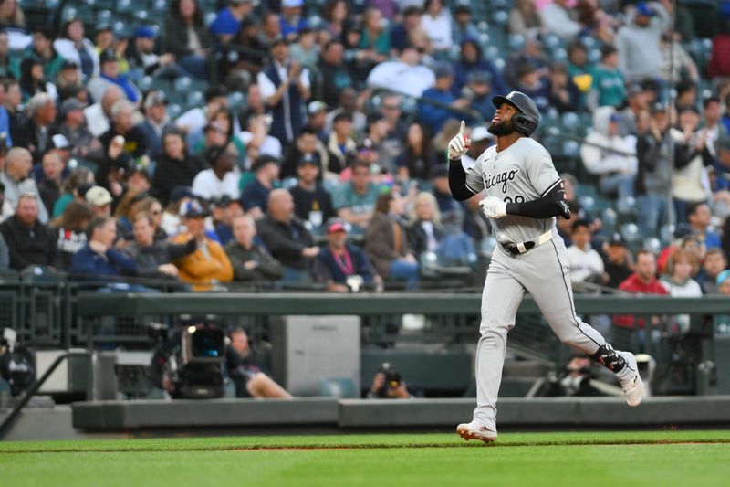 Jun 12, 2024; Seattle, Washington, USA; Chicago White Sox center fielder Luis Robert Jr. (88) runs the bases after hitting a home run against the Seattle Mariners during the ninth inning at T-Mobile Park. Mandatory Credit: Steven Bisig-USA TODAY Sports