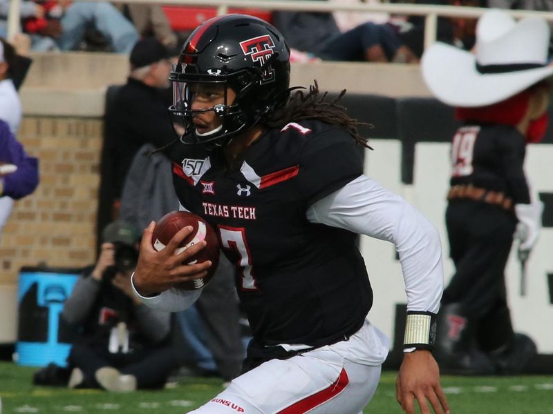 Nov 16, 2019; Lubbock, TX, USA; Texas Tech Red Raiders quarterback Jett Duffey (7) runs the ball against the Texas Christian Horned Frogs in the first half at Jones AT&T Stadium. Mandatory Credit: Michael C. Johnson-USA TODAY Sports