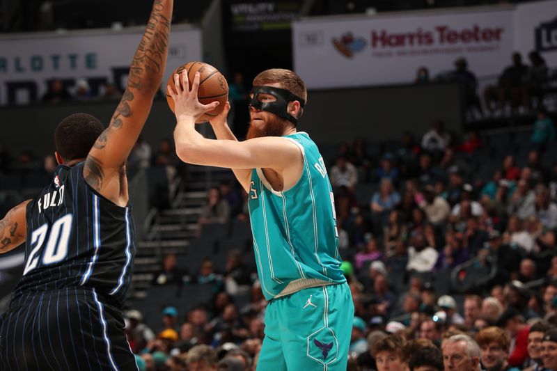 CHARLOTTE, NC - APRIL 5: Davis Bertans #9 of the Charlotte Hornets handles the ball during the game against the Orlando Magic on April 5, 2024 at Spectrum Center in Charlotte, North Carolina. NOTE TO USER: User expressly acknowledges and agrees that, by downloading and or using this photograph, User is consenting to the terms and conditions of the Getty Images License Agreement. Mandatory Copyright Notice: Copyright 2024 NBAE (Photo by Kent Smith/NBAE via Getty Images)