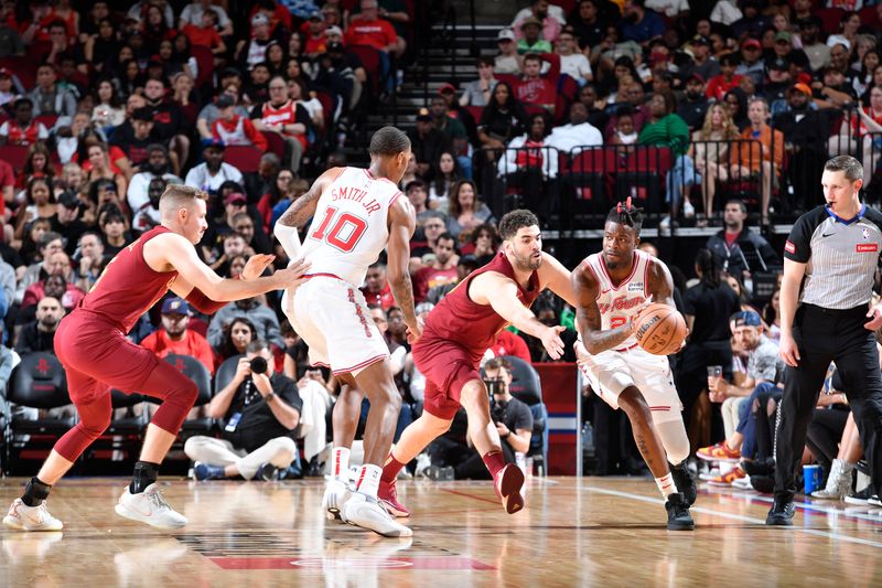 HOUSTON, TX - MARCH 16: Reggie Bullock Jr. #25 of the Houston Rockets dribbles the ball during the game against the Cleveland Cavaliers  on March 16, 2023 at the Toyota Center in Houston, Texas. NOTE TO USER: User expressly acknowledges and agrees that, by downloading and or using this photograph, User is consenting to the terms and conditions of the Getty Images License Agreement. Mandatory Copyright Notice: Copyright 2024 NBAE (Photo by Logan Riely/NBAE via Getty Images)