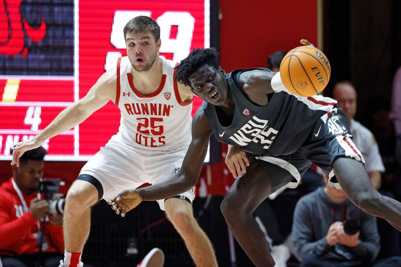 Jan 19, 2023; Salt Lake City, Utah, USA;  Washington State Cougars forward Mouhamed Gueye (35)m and Utah Utes guard Rollie Worster (25) battle in the second half at Jon M. Huntsman Center. Mandatory Credit: Jeffrey Swinger-USA TODAY Sports