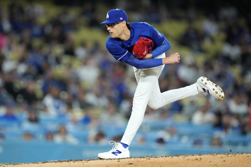 Mar 25, 2024; Los Angeles, California, USA; Los Angeles Dodgers relief pitcher Joe Kelly (99) throws in the fifth inning against the Los Angeles Angels at Dodger Stadium. Mandatory Credit: Kirby Lee-USA TODAY Sports