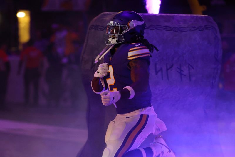 Minnesota Vikings running back Alexander Mattison (2) runs onto the field before an NFL football game against the Chicago Bears, Monday, Nov. 27, 2023, in Minneapolis. (AP Photo/Bruce Kluckhohn)