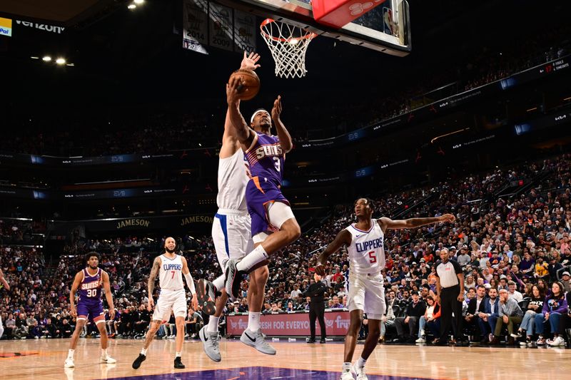 PHOENIX, AZ - APRIL  9:  Bradley Beal #3 of the Phoenix Suns drives to the basket during the game against the LA Clippers on April 9, 2024 at Footprint Center in Phoenix, Arizona. NOTE TO USER: User expressly acknowledges and agrees that, by downloading and or using this photograph, user is consenting to the terms and conditions of the Getty Images License Agreement. Mandatory Copyright Notice: Copyright 2024 NBAE (Photo by Kate Frese/NBAE via Getty Images)