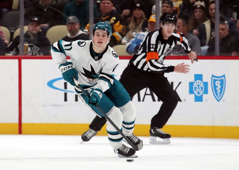 Nov 16, 2024; Pittsburgh, Pennsylvania, USA;  San Jose Sharks center Macklin Celebrini (71) skates up ice with the puck against the Pittsburgh Penguins during the second period at PPG Paints Arena. Mandatory Credit: Charles LeClaire-Imagn Images