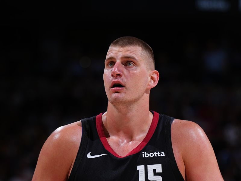 DENVER, CO - APRRIL 22: Nikola Jokic #15 of the Denver Nuggets shoots a free throw during the game against the Los Angeles Lakers during Round 1 Game 2 of the 2024 NBA Playoffs on April 22, 2024 at the Ball Arena in Denver, Colorado. NOTE TO USER: User expressly acknowledges and agrees that, by downloading and/or using this Photograph, user is consenting to the terms and conditions of the Getty Images License Agreement. Mandatory Copyright Notice: Copyright 2024 NBAE (Photo by Garrett Ellwood/NBAE via Getty Images)