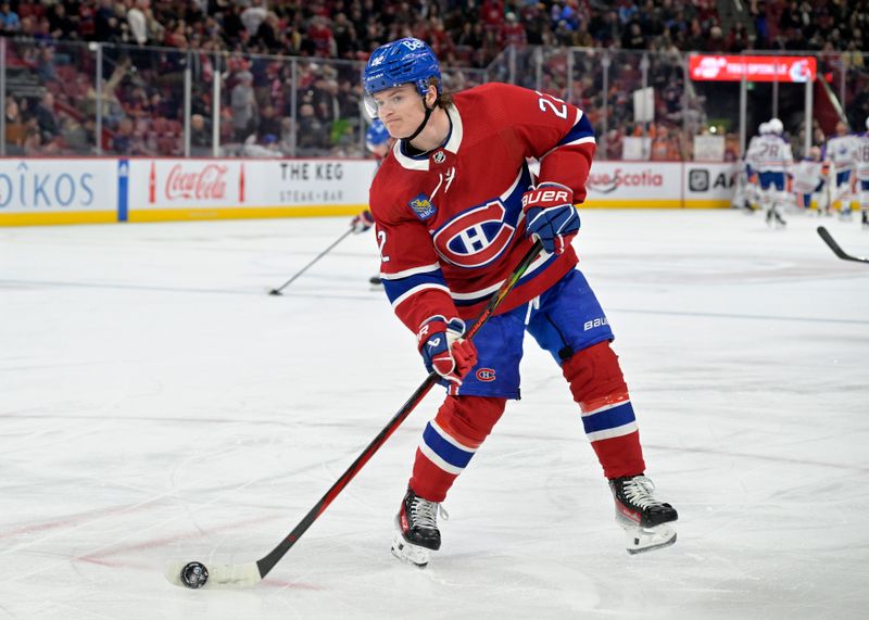 Jan 13, 2024; Montreal, Quebec, CAN; Montreal Canadiens forward Cole Caufield (22) shoots a puck during the warmup period before the game against the Edmonton Oilers at the Bell Centre. Mandatory Credit: Eric Bolte-USA TODAY Sports