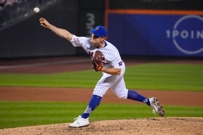 Jul 2, 2023; New York City, New York, USA; New York Mets pitcher David Robertson (30) delivers a pitch against the San Francisco Giants during the ninth inning at Citi Field. Mandatory Credit: Gregory Fisher-USA TODAY Sports