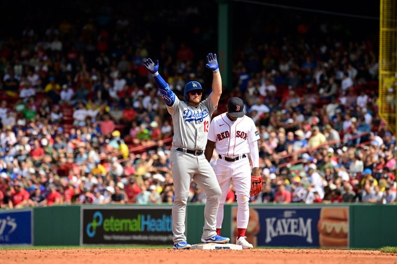 Aug 27, 2023; Boston, Massachusetts, USA; Los Angeles Dodgers third baseman Max Muncy (13) reacts to hitting a double against the Boston Red Sox during the third inning at Fenway Park. Mandatory Credit: Eric Canha-USA TODAY Sports