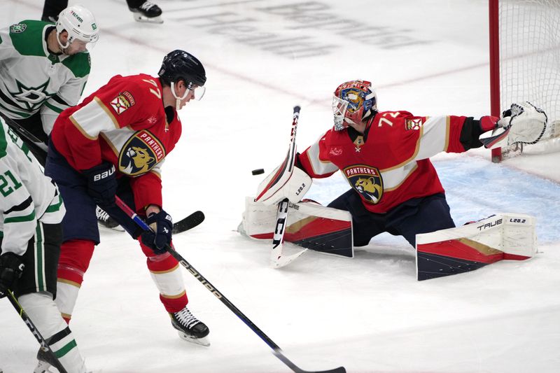 Dec 6, 2023; Sunrise, Florida, USA; Dallas Stars right wing Evgenii Dadonov, left, scores a goal past Florida Panthers goaltender Sergei Bobrovsky (72) during the third period at Amerant Bank Arena. Mandatory Credit: Jim Rassol-USA TODAY Sports