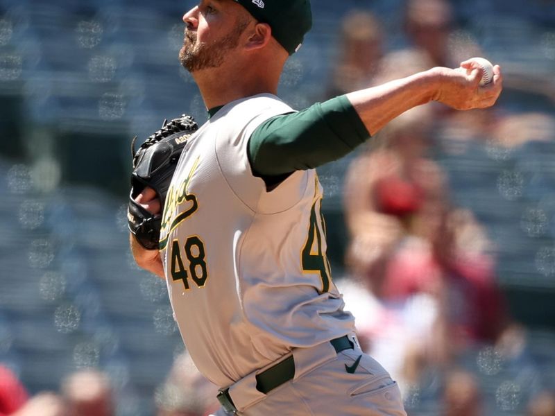 Jun 26, 2024; Anaheim, California, USA;  Oakland Athletics relief pitcher T.J. McFarland (48) pitches during the sixth inning against the Los Angeles Angels at Angel Stadium. Mandatory Credit: Kiyoshi Mio-USA TODAY Sports