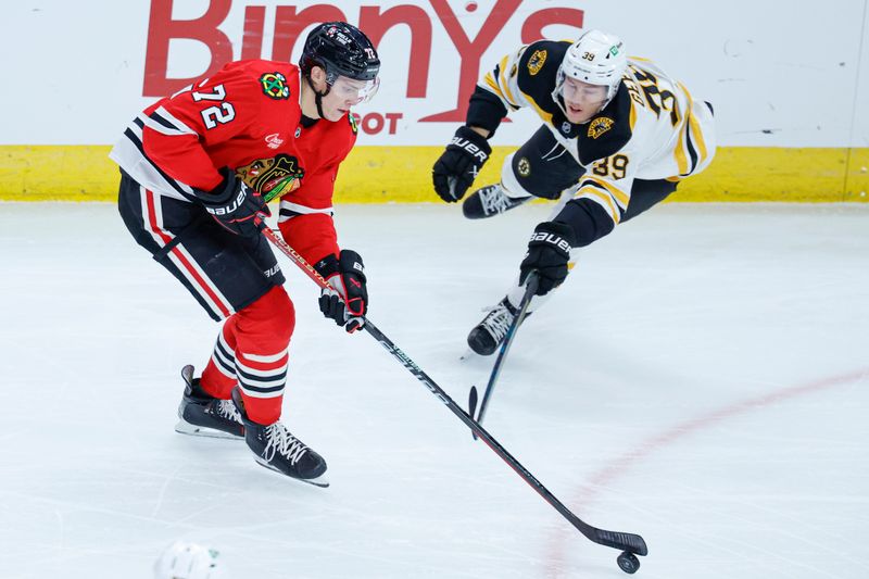 Dec 4, 2024; Chicago, Illinois, USA; Chicago Blackhawks defenseman Alex Vlasic (72) battles for the puck with Boston Bruins center Morgan Geekie (39) during the second period at United Center. Mandatory Credit: Kamil Krzaczynski-Imagn Images