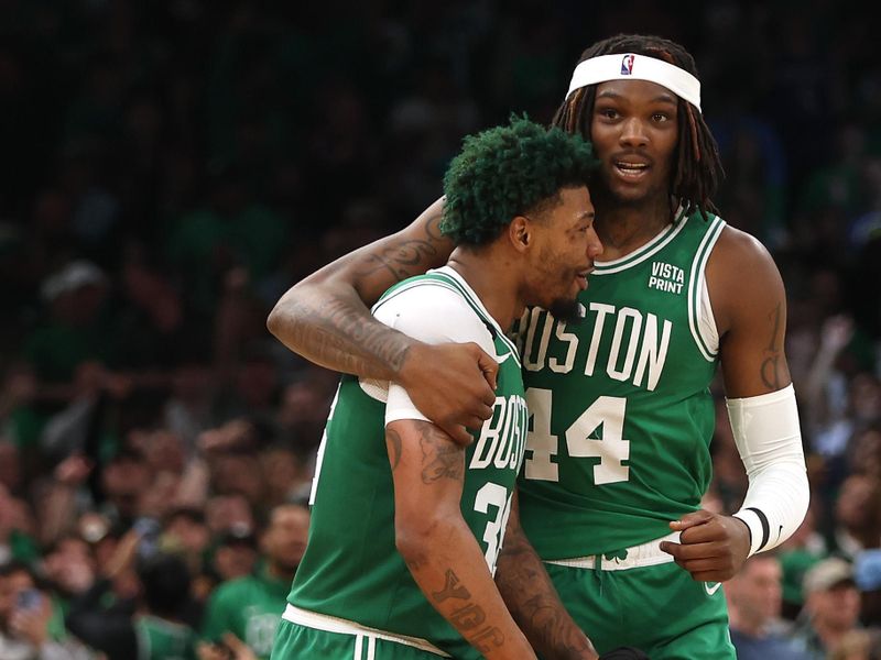 BOSTON, MASSACHUSETTS - MAY 14: Marcus Smart #36 and Robert Williams III #44 of the Boston Celtics talk against the Philadelphia 76ers during the third quarter in game seven of the 2023 NBA Playoffs Eastern Conference Semifinals at TD Garden on May 14, 2023 in Boston, Massachusetts. NOTE TO USER: User expressly acknowledges and agrees that, by downloading and or using this photograph, User is consenting to the terms and conditions of the Getty Images License Agreement. (Photo by Adam Glanzman/Getty Images)