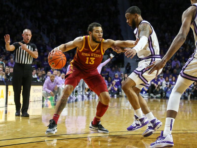 Feb 18, 2023; Manhattan, Kansas, USA; Iowa State Cyclones guard Jaren Holmes (13) is guarded by Kansas State Wildcats guard Desi Sills (13) during the second half at Bramlage Coliseum. Mandatory Credit: Scott Sewell-USA TODAY Sports