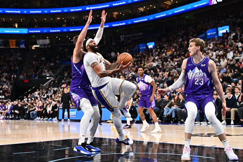 SALT LAKE CITY, UT - DECEMBER 1: Anthony Davis #3 of the Los Angeles Lakers drives to the basket during the game against the Utah Jazz on December 1, 2024 at Delta Center in Salt Lake City, Utah. NOTE TO USER: User expressly acknowledges and agrees that, by downloading and or using this Photograph, User is consenting to the terms and conditions of the Getty Images License Agreement. Mandatory Copyright Notice: Copyright 2024 NBAE (Photo by Jamie Sabau/NBAE via Getty Images)