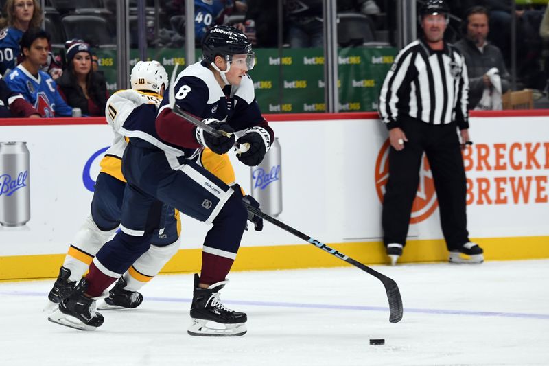 Nov 11, 2024; Denver, Colorado, USA; Colorado Avalanche defenseman Cale Makar (8) skates with the puck during the first period against the Nashville Predators at Ball Arena. Mandatory Credit: Christopher Hanewinckel-Imagn Images