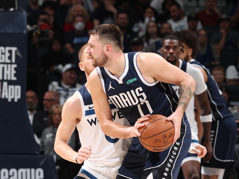 MINNEAPOLIS, MN -  OCTOBER 29:  Luka Doncic #77 of the Dallas Mavericks looks to pass the ball during the game against the Minnesota Timberwolves on October 29, 2024 at Target Center in Minneapolis, Minnesota. NOTE TO USER: User expressly acknowledges and agrees that, by downloading and or using this Photograph, user is consenting to the terms and conditions of the Getty Images License Agreement. Mandatory Copyright Notice: Copyright 2024 NBAE (Photo by David Sherman/NBAE via Getty Images)