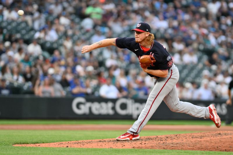 Jun 27, 2023; Seattle, Washington, USA; Washington Nationals relief pitcher Mason Thompson (71) pitches to the Seattle Mariners during the sixth inning at T-Mobile Park. Mandatory Credit: Steven Bisig-USA TODAY Sports