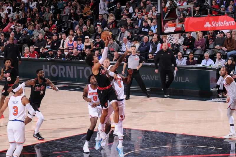 PORTLAND, OR - MARCH 14: Matisse Thybulle #4 of the Portland Trail Blazers drives to the basket during the game against the New York Knicks on March 14, 2024 at the Moda Center Arena in Portland, Oregon. NOTE TO USER: User expressly acknowledges and agrees that, by downloading and or using this photograph, user is consenting to the terms and conditions of the Getty Images License Agreement. Mandatory Copyright Notice: Copyright 2024 NBAE (Photo by Cameron Browne/NBAE via Getty Images)