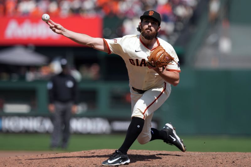 May 3, 2025; San Francisco, California, USA; San Francisco Giants relief pitcher Ryan Walker (74) throws a pitch against the Colorado Rockies during the ninth inning at Oracle Park. Mandatory Credit: Darren Yamashita-Imagn Images